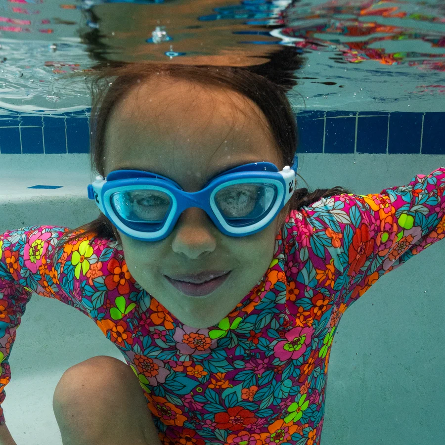 Little Fish Swim School swimmer in the pool, get answers to your swim lesson questions